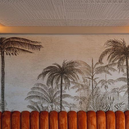 Hotel Jadali & Spa مراكش المظهر الخارجي الصورة Palm trees on the wall of the lobby