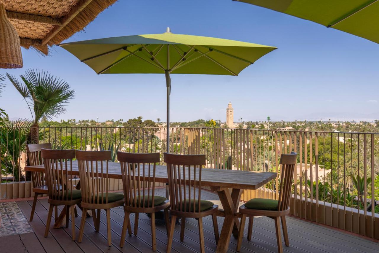 Hotel Jadali & Spa مراكش المظهر الخارجي الصورة A patio umbrella